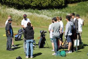 student golfers on green