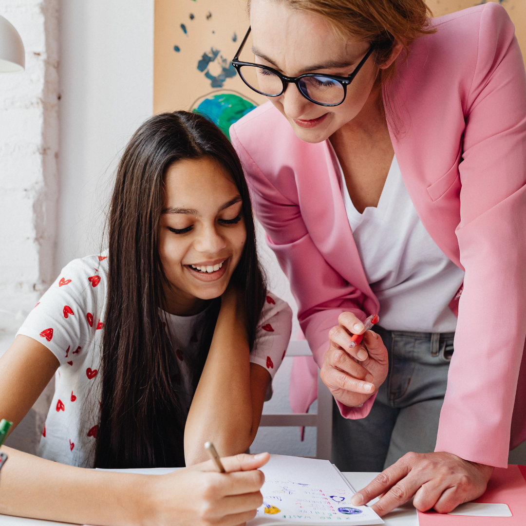 Picture of a teacher and student.