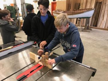 Students with bandsaw