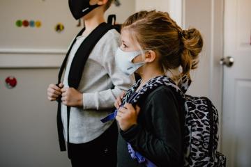 child wearing a mask