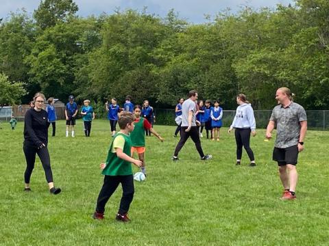 Student vs staff soccer game at David Cameron