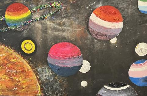 We received a SD 62 grant to create an inclusive, 2SLGBTQ+ mural depicting the various SOGI Flags as planets.