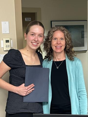 Former Belmont Secondary student Katelyn Vandermark with Principal Laura Fulton.